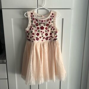 New without tags (never worn). Blush tulle dress. Size 4/5 XS